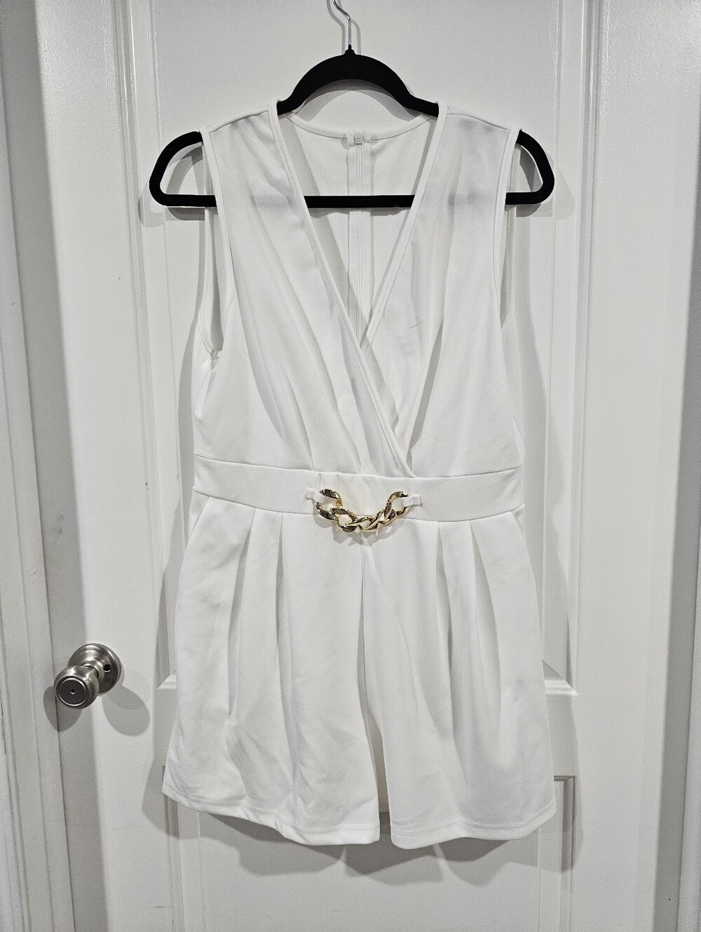 Sleeveless White V-Neck Romper with Gold Chain Accent